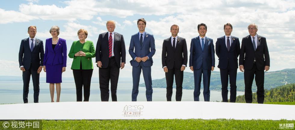 g7领导人照片刷屏默克尔剑拔弩张特朗普被围攻