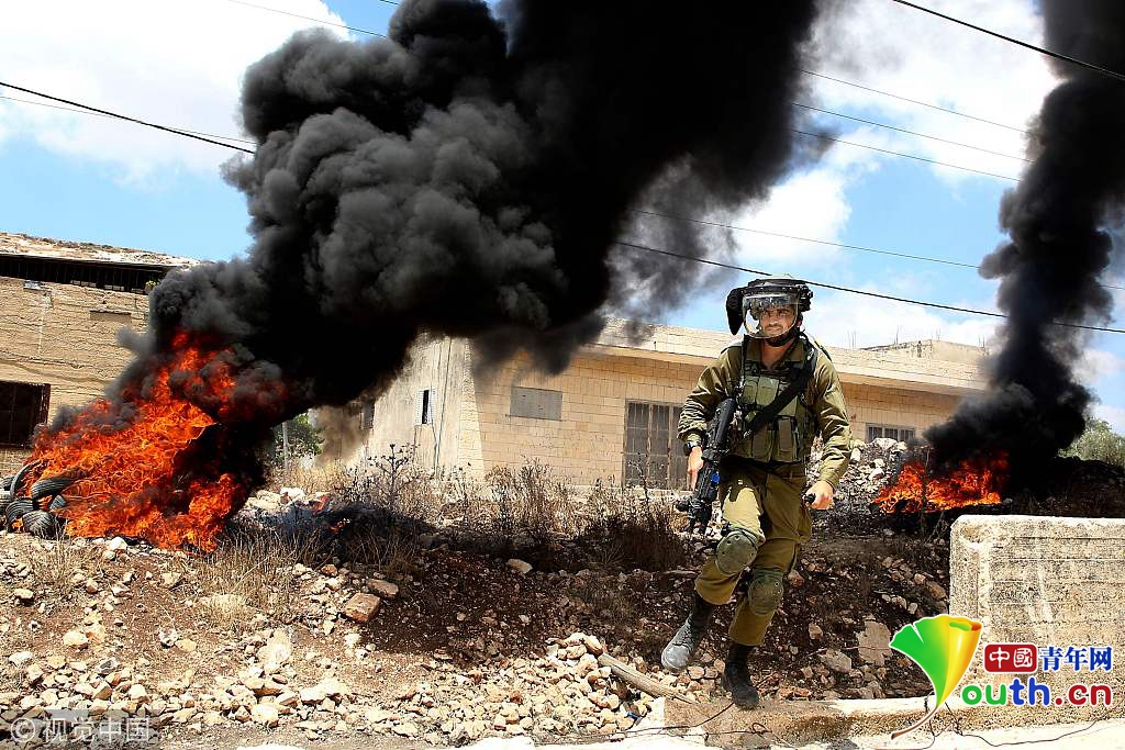 巴勒斯坦民众与以色列部队激烈冲突 抗议修建
